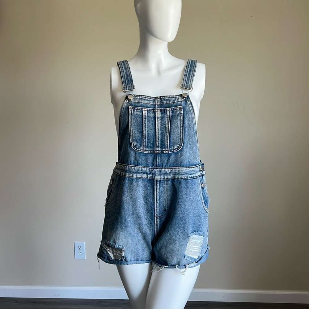 Women's Distressed Overalls.